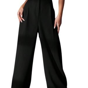 Woman wearing high waist black wide leg palazzo pants paired with white crop top and sneakers