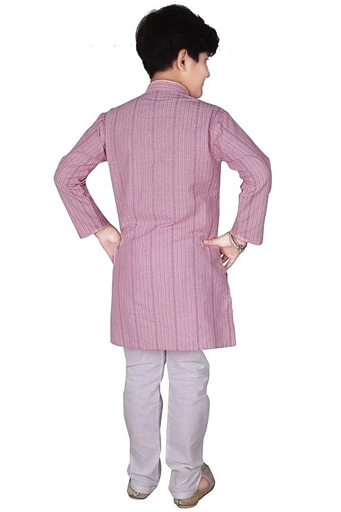 Young boy wearing a pink striped kurta with pajama pants and traditional shoes.