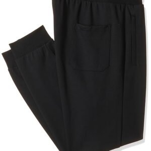 Men wearing black slim fit jogger pants with drawstring waist and black sneakers on white background